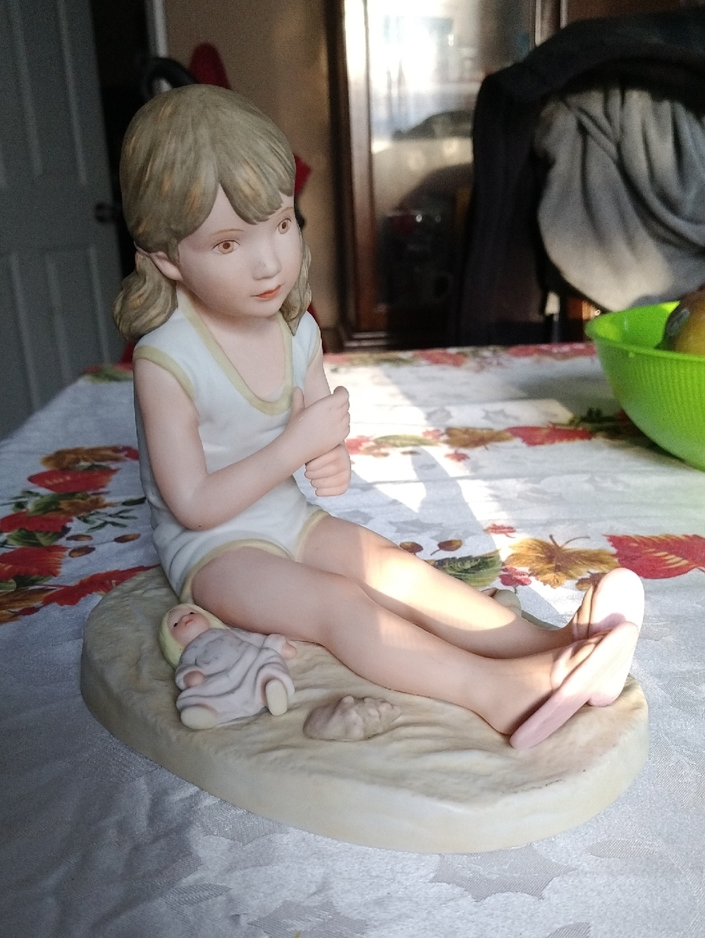 Porcelain Girl Figurine with Doll - Pale Pastel Colors